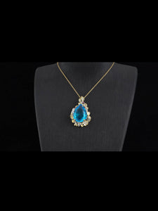 Swiss Blue Topaz Pendant Necklace - Simulated purple and green Diamond in dualtone goldtone and Stainless Steel